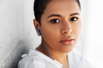 Image showing african american woman with earphones