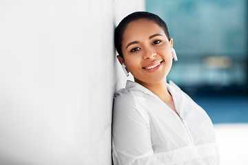 Image showing happy african american woman with earphones