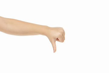 Image showing Children\'s hand, palm gesturing isolated on white studio background