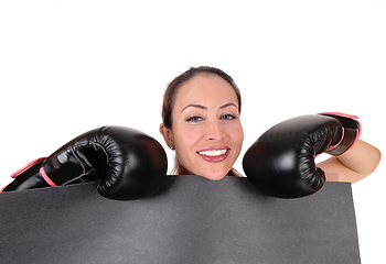 Image showing Woman with boxing gloves looking smiling