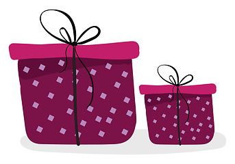 Image showing Two beautiful pink present boxes tied with a black ribbon and to