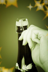 Image showing Opening champagne bottle