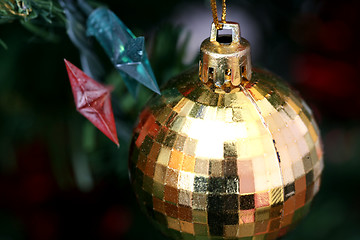 Image showing Christmas ornaments on tree.