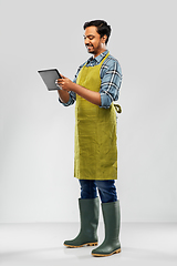 Image showing indian male gardener or farmer with tablet pc