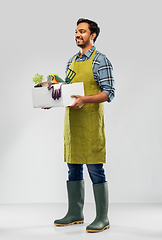 Image showing indian gardener or farmer with box of garden tools