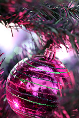 Image showing Christmas ornaments on tree.