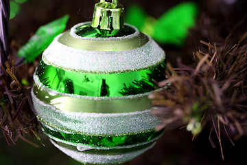 Image showing Christmas ornaments on tree.