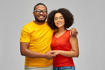 Image showing happy african american couple in glasses hugging