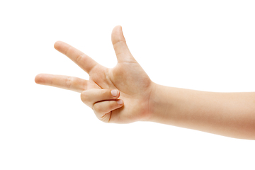 Image showing Children\'s hand, palm gesturing isolated on white studio background