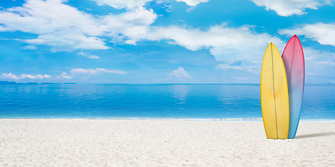 Image showing Summer concept flyer. Surfing boards with beach, sand and ocean or sea on background