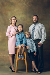 Image showing Happy family traditional portrait, old-fashioned. Cheerful parents and kids