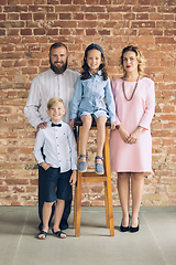 Image showing Happy family traditional portrait, old-fashioned. Cheerful parents and kids