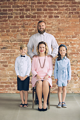 Image showing Happy family traditional portrait, old-fashioned. Cheerful parents and kids