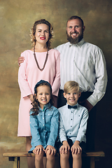 Image showing Happy family traditional portrait, old-fashioned. Cheerful parents and kids