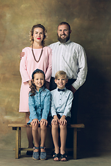 Image showing Happy family traditional portrait, old-fashioned. Cheerful parents and kids