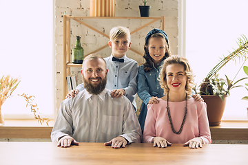 Image showing Happy family traditional portrait, old-fashioned. Cheerful parents and kids