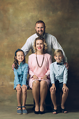 Image showing Happy family traditional portrait, old-fashioned. Cheerful parents and kids