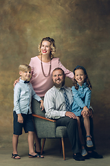 Image showing Happy family traditional portrait, old-fashioned. Cheerful parents and kids