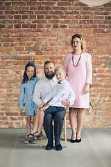 Image showing Happy family traditional portrait, old-fashioned. Cheerful parents and kids