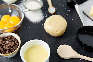 Image showing dough, baking dish and cooking ingredients