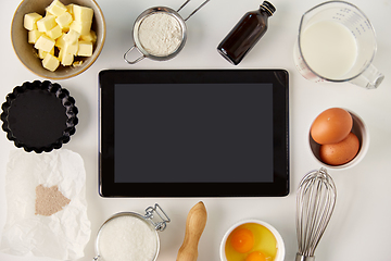 Image showing tablet computer and cooking ingredients on table