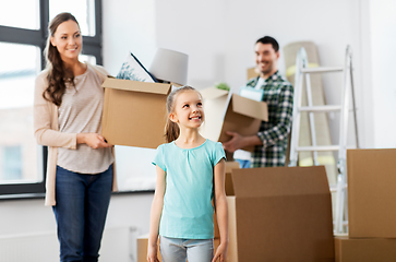 Image showing happy family with child moving to new home