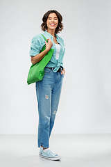 Image showing woman with reusable canvas bag for food shopping