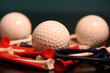 Image showing Golf balls and tees