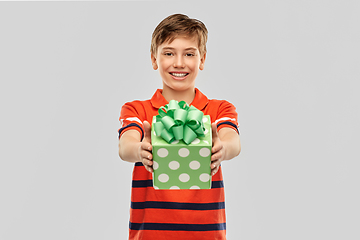 Image showing portrait of happy smiling boy with gift box