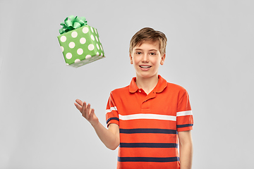 Image showing portrait of happy smiling boy with gift box