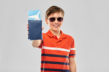 Image showing happy boy in sunglasses with ticket and passport