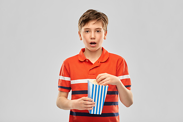 Image showing boy eating popcorn