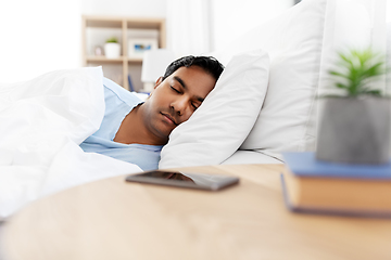 Image showing indian man sleeping in bed at home