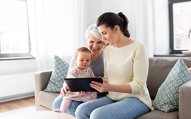 Image showing mother, daughter and grandma with tablet pc