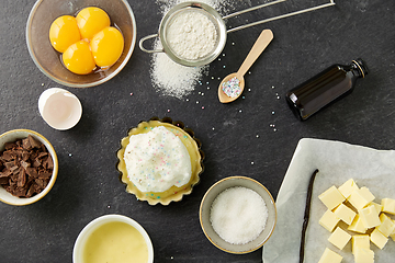 Image showing baking dish with dough and cooking ingredients