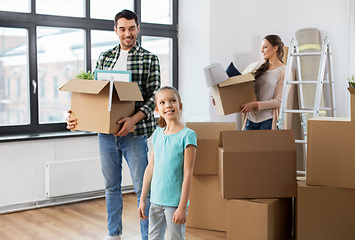 Image showing happy family with child moving to new home