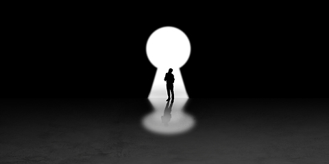 Image showing Silhouette of man walking in the night toward the light, view from above