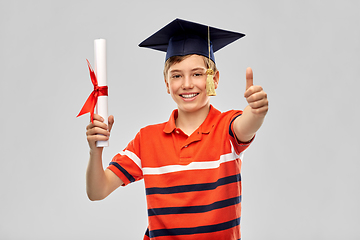 Image showing graduate student boy in mortarboard with diploma