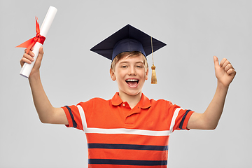 Image showing graduate student boy in mortarboard with diploma