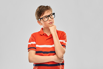 Image showing portrait of thinking boy in eyeglasses