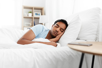 Image showing indian man sleeping in bed at home