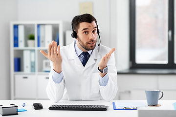 Image showing doctor with headset having video call at hospital