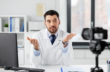 Image showing male doctor recording video blog at hospital