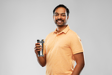 Image showing indian man with thermo cup or tumbler for drink