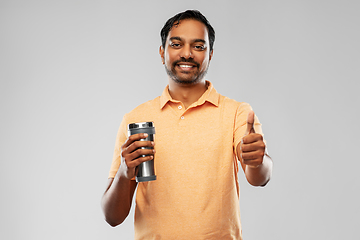 Image showing indian man with thermo cup or tumbler for drink