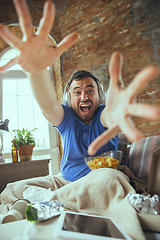 Image showing Lazy man living the whole life in his bed surrounded with messy