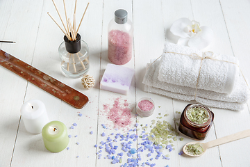 Image showing Beautiful spa composition on massage table in wellness center, copyspace