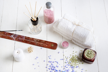 Image showing Beautiful spa composition on massage table in wellness center, copyspace