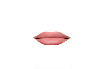 Image showing Close up view of female mouth wearing nude lipstick isolated over white studio background