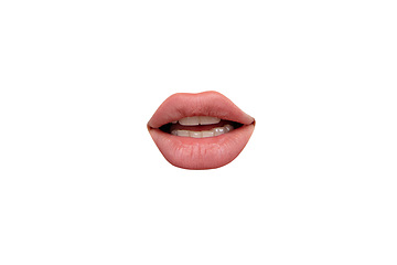 Image showing Close up view of female mouth wearing nude lipstick isolated over white studio background